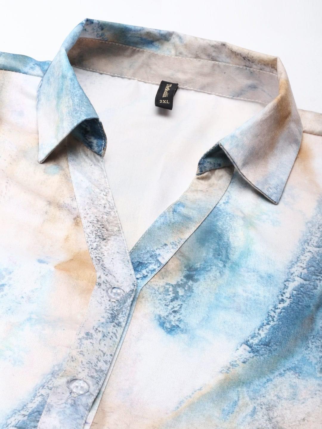 Captivating multi-color satin shirt showcasing a palette of vibrant hues, infusing elegance and style. Versatile wardrobe essential for a chic and modern look on any occasion.