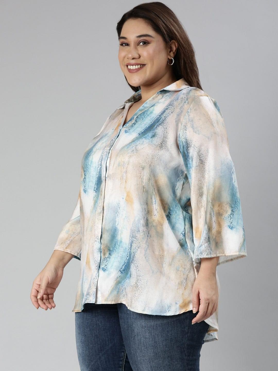 Multicolored satin shirt with a blend of rich hues, offering a touch of elegance and style. Perfect wardrobe essential for a trendy and vibrant look on any occasion.